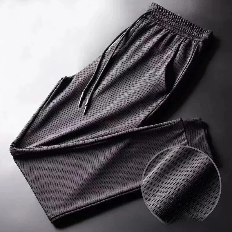Męskie letnie cienkie spodnie lodowy jedwab luźna odzież robocza casualowe szybkoschnący spodnie sportowe długa, oddychająca wysoką elastyczność