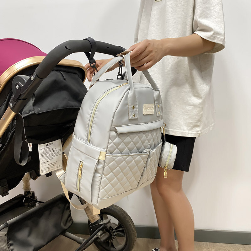 Bolsa de pañales para bebé, mochila de maternidad duradera, bolsas de gran capacidad, mochilas de viaje impermeables, paquete al aire libre para mamá, nuevo