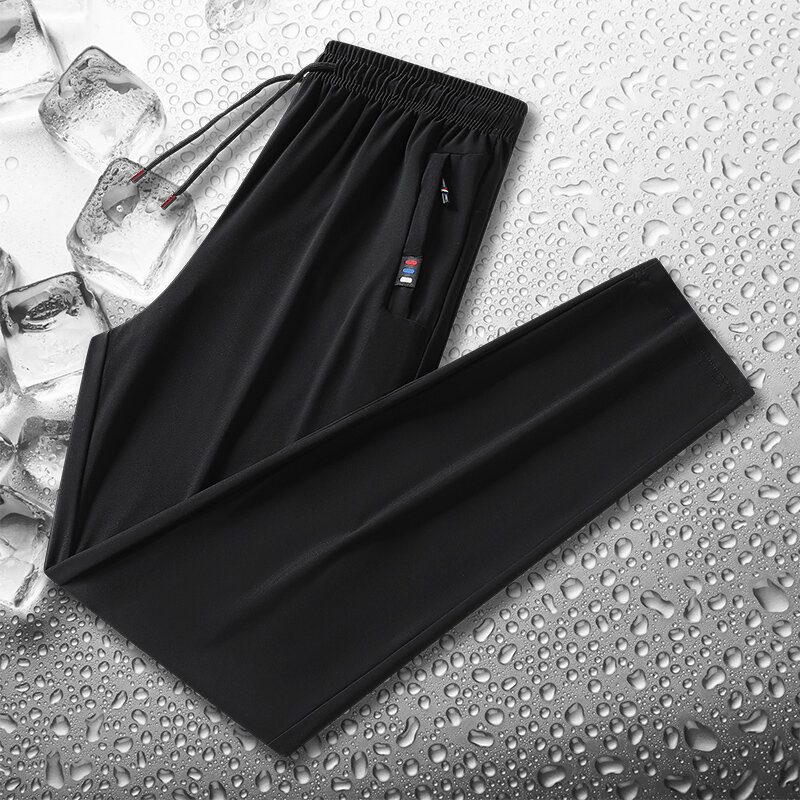 Letnie męskie elastyczne spodnie sportowe Cienkie, oddychające spodnie do biegania na świeżym powietrzu w dużych rozmiarach Elastyczna talia Speed Dry Ice Silk Pants