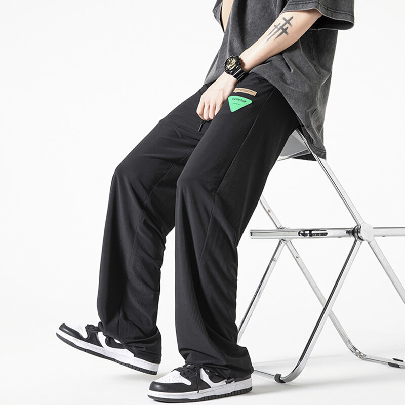 Letnie nowe męskie spodnie lodowy jedwab luźne elastyczne jednolity kolor sznurek ze sznurkiem do spodnie do joggingu Outdoor sportowe M-5XL