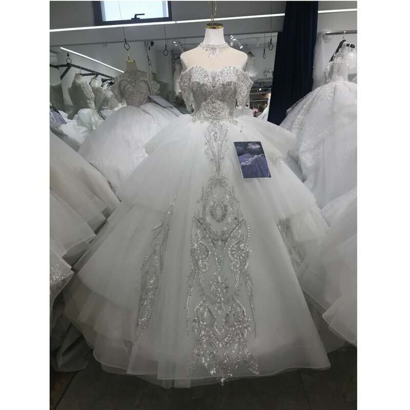 Kolekcja KISSWHITE dla nowożeńców Xlove błyszczy kryształowa suknia balowa wykonana na zamówienie suknia ślubna z ramienia