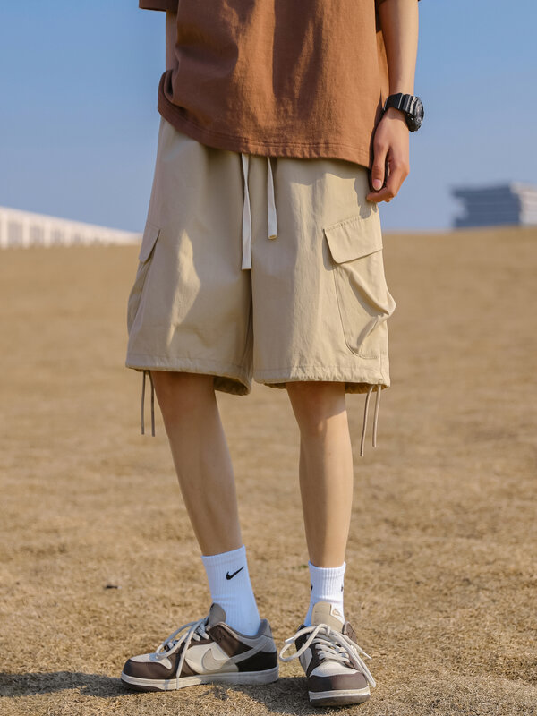Celana pendek 3 warna celana pendek pria desain saku musim panas Harajuku latihan sederhana longgar sehari-hari populer celana panjang jalan tinggi gaya Jepang