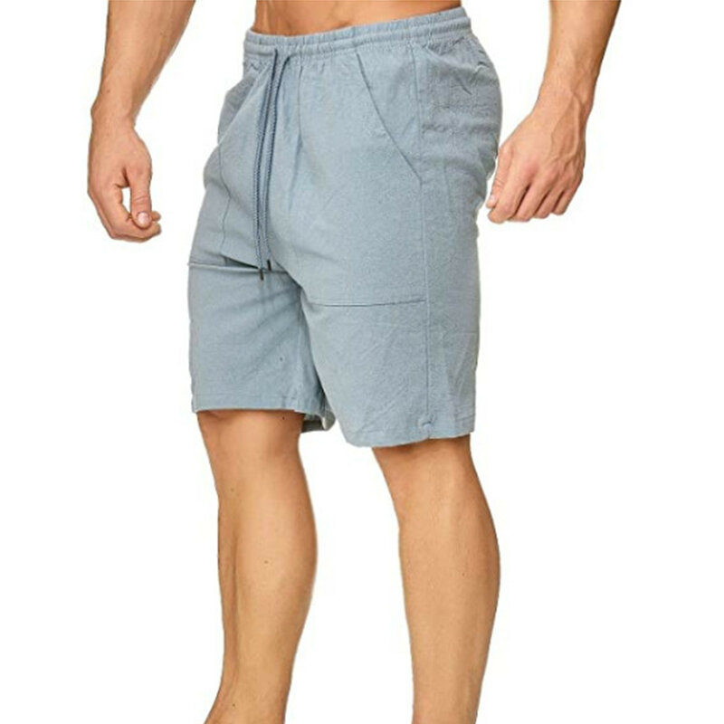 กางเกงขาสั้นคาร์โก้ผู้ชายแฟชั่นสีทึบบางทรงหลวมมีกระเป๋าเอวแบบลำลองมีเชือกผูกเอวกระเป๋าสไตล์สตรีท