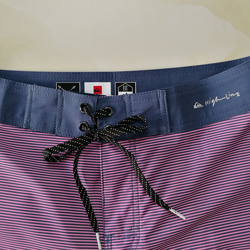 Celana pendek pantai versi Korea pria, baru musim panas longgar santai pabrik sumber penjualan langsung celana renang selancar celana pendek gym pria