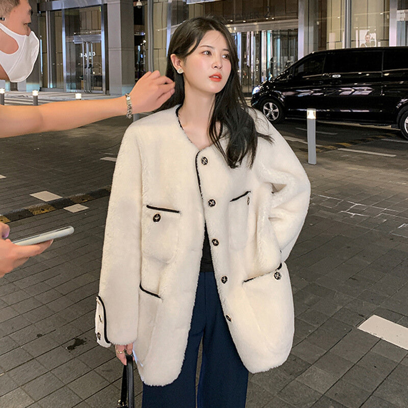 Abrigo de lana de oveja medio y largo para mujer, abrigo integrado de piel de cordero, versión coreana, celebridad de temperamento, nuevo estilo