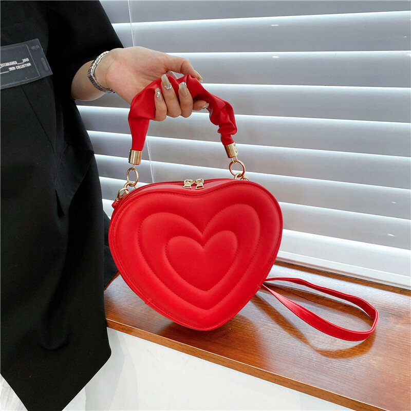 Bolsa crossbody em forma de coração para mulheres, bolsas de couro PU, bolsa estilingue casual fofa, moda amor