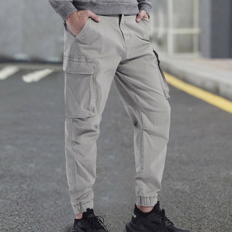 Tuta da uomo con cerniera in vita Multi-tasca tinta unita pantaloni alla caviglia tasca Casual Harajuku nera abbigliamento Unisex 2024 estate
