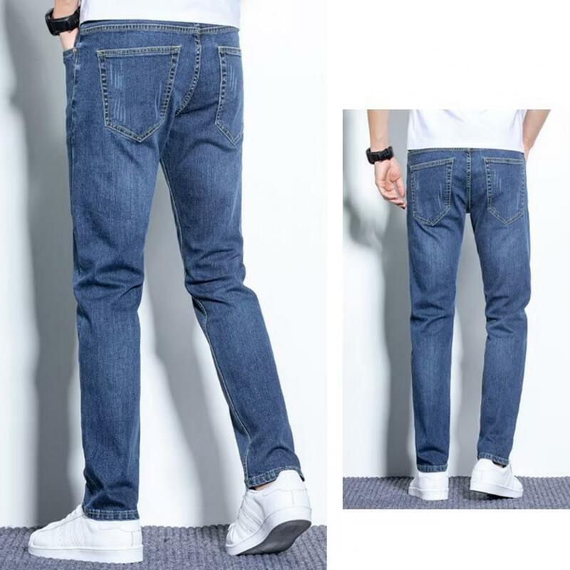 กางเกงยีนส์มีซิปปิดเอวมีกระดุมที่กางเกงยีนส์ของผู้ชายกางเกงยีนส์ขาเล็กมีกระเป๋าสีทึบสำหรับทุกวัน