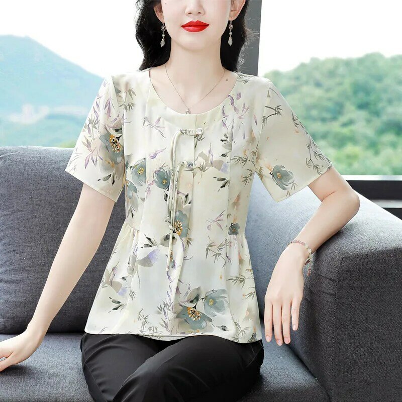 Letnia moda kwiatowy Print O-neck bluzki z krótkim rękawem damskie dorywczo luźna bandaż szyfonowe koszule eleganckie eleganckie topy M-4XL
