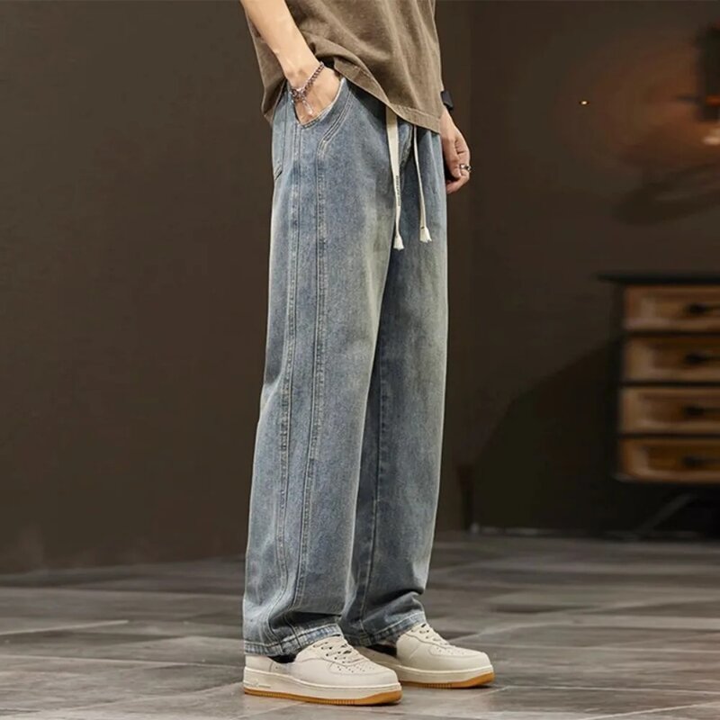 กางเกงยีนส์กางเกงยีนส์ขายาวสำหรับยีนส์ขากระบอกผู้ชายผ้ายืดทรงหลวมสไตล์เกาหลีแนวสปอร์ตแบบ2024New