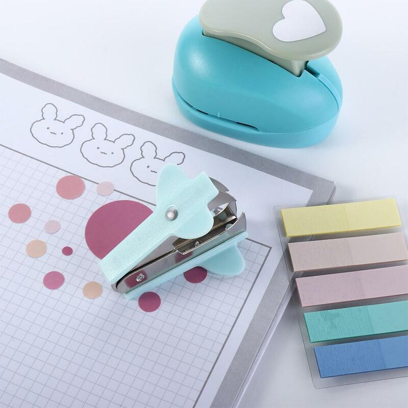 Alat penghilang Staples warna Macaron penghilang Staples Mini ekstraktor Staples praktis multi fungsi kuku keluar penarik Staples