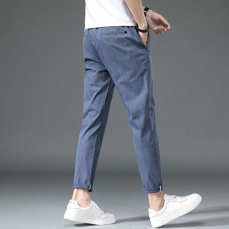 Pantalones rectos versátiles simples de seda de hielo para hombre, pantalones casuales delgados con bolsillos de cremallera, botón sólido, moda de verano, nuevo