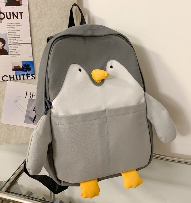 Mochila dos desenhos animados Little Penguin para meninos e meninas, bolsa de estudante personalizada, saco bonito do livro do estudante, nome personalizado