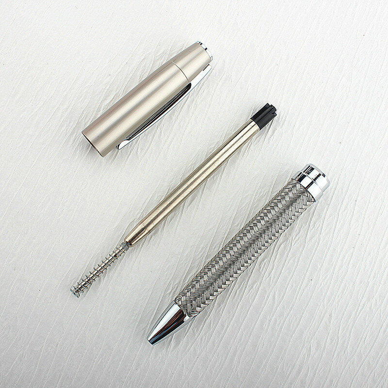 Stylo à bille en métal tissé en fil d'acier de luxe, stylos à bille rayés, stylos à bille roulants en métal rotatif