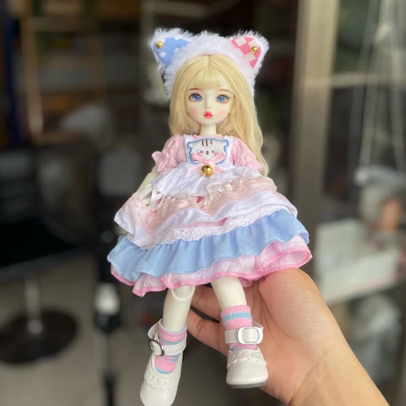BJD Doll 1/6 set completo con vestiti alla moda e parrucca morbida 30cm occhi multicolori bambola snodata per il trucco carino per i giocattoli regalo della ragazza