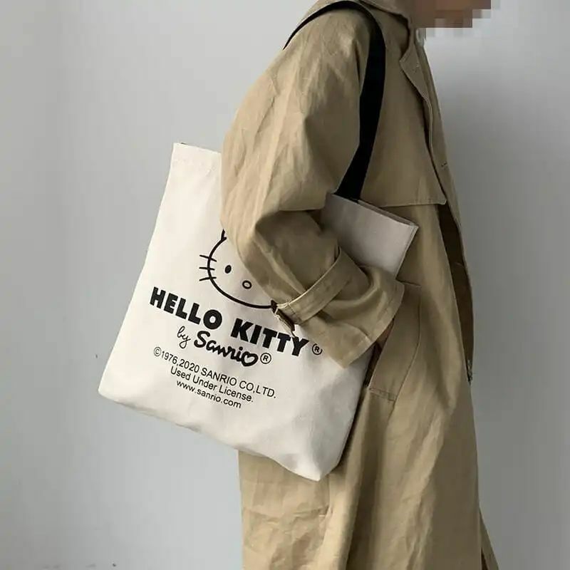 مرحبا كيتي سانريو قماش حقيبة الكتف موضة حمل عالية السعة عادية طباعة أنيمي حقيبة يد السيدات قابلة لإعادة الاستخدام المتسوق حمل حقيبة
