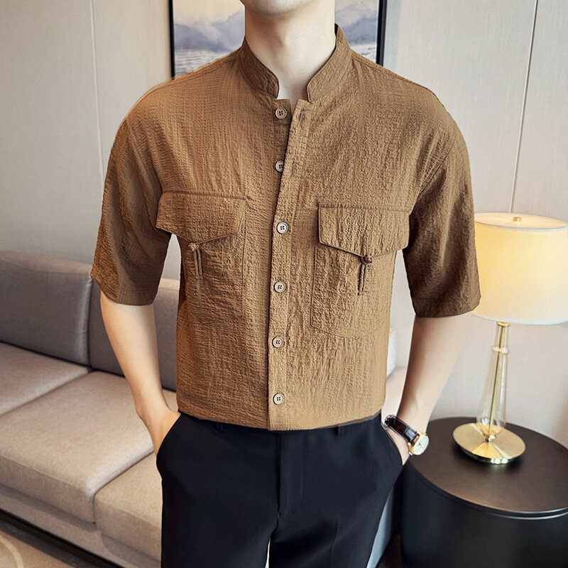 Camisa de manga corta para hombre, camisa de estilo chino de Color sólido con diseño de bolsillo, botones de moda, S-2XL