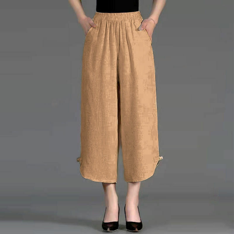 เสื้อผ้ามีกระเป๋าสำหรับผู้หญิงวินเทจสีทึบเอวยางยืดทรงหลวมสำหรับผู้หญิงกางเกงขาม้า2024ใหม่
