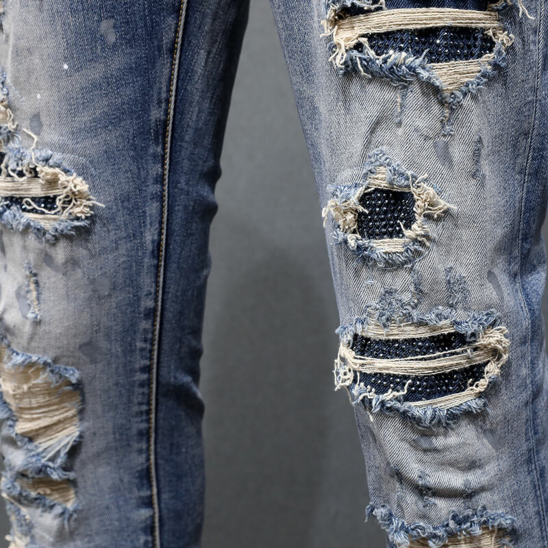 Pantalones vaqueros rasgados pintados con agujeros para hombre, Jeans elásticos Retro azules, pantalones de marca de Hip Hop con parches de cuentas, moda urbana