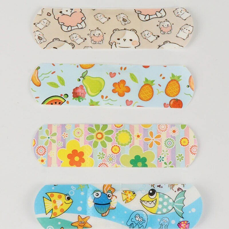 100 sztuk/partia samoprzylepne plastry oddychające wodoodporne bandaże śliczne kreskówkowe wzorzyste łatki na paski bandaże dla dzieci