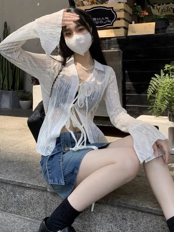 Nuove donne Sexy Chiffon Lace Up crema solare vestiti estate moda coreana Jacquard Hollow corno maniche dolce donna Cardigan Top