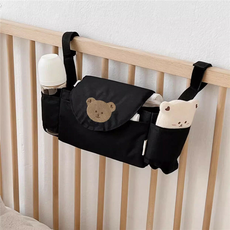 Portable baby stroller hanging bag, children's stroller hanging bag storage bag, cartoon bear embroidered mummy bag