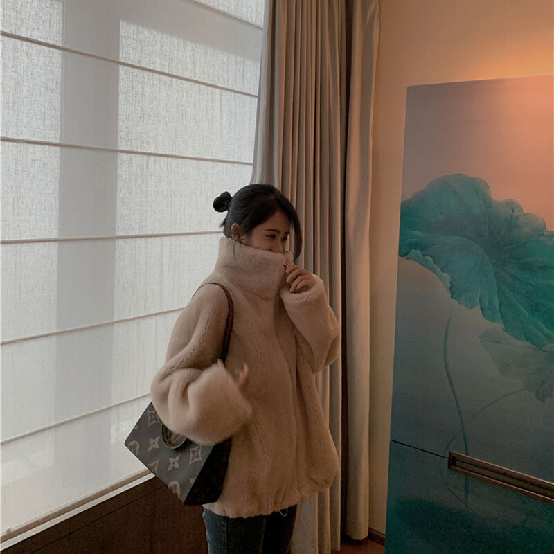 A nova versão coreana do casaco de lã de cordeiro gola solta grão ovelha sheared velo pele integrada casaco de pele feminina inverno