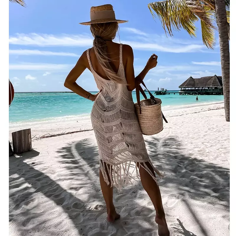Túnica de ganchillo blanca para mujer, vestido ahuecado Sexy, ropa de verano transparente, ropa de playa con borlas, 2024