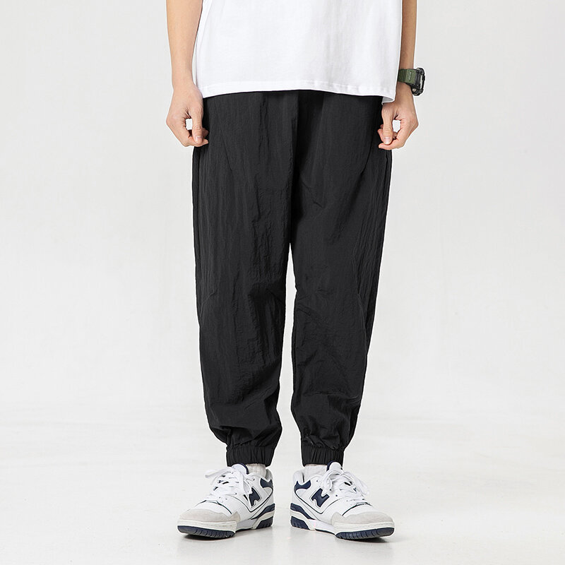 Minimalist Fashion Pocket Elastic Waist Drawstring Men's Summer Solid Color Motion Bound Feet Casual Loose Ankle Length Pants