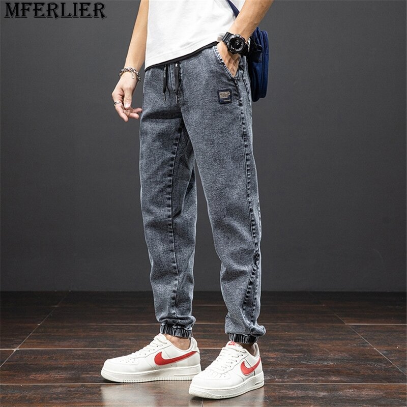 Celana panjang Denim pria, Jeans Jogger pria ukuran besar 8XL, celana Denim modis kasual pinggang elastis warna Solid ukuran besar 8XL