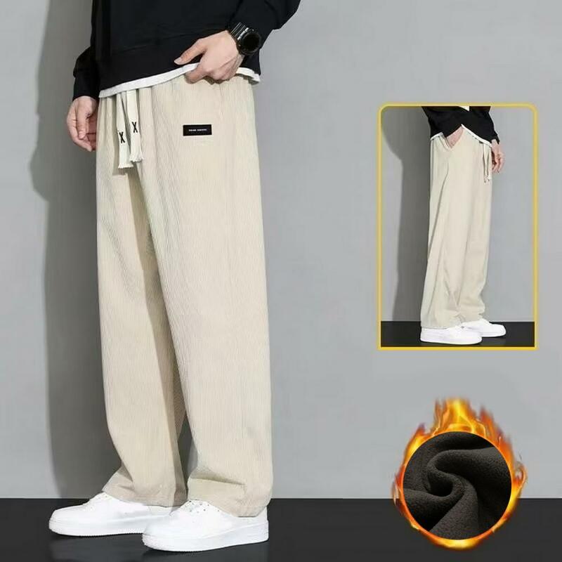 Pantalones de pana de Color puro para hombre, pantalones de pana con estilo, cintura elástica cómoda, ajuste suelto, bolsillos para otoño