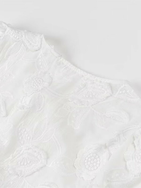 Kwiatowa haftowana bluzka damska 2024 nowa letnia szykowna O-neck z krótkim rękawem sznurowane bluzki kobiece dorywczo proste białe koszule topy
