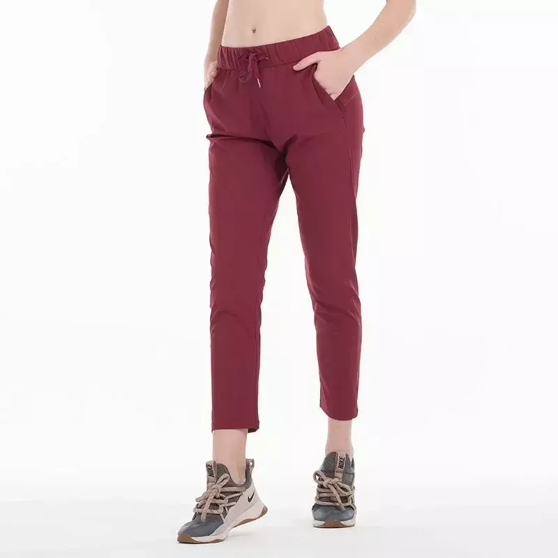 Legginsy do biegania treningowy dla kobiet Lulu 4 sposoby rozciągliwa tkanina Super jakościowe spodnie do jogi z boczne kieszenie spodnie sportowe na siłownię na świeżym powietrzu