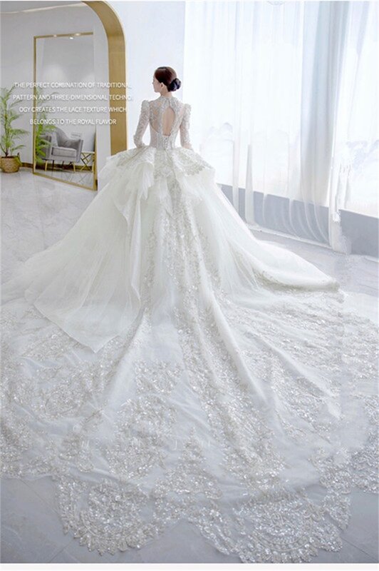 Abito da ballo di cristallo di lusso abito da sposa principessa perle paillettes Dubai Arabia Puffy maniche lunghe abito da sposa Robe De Mariée