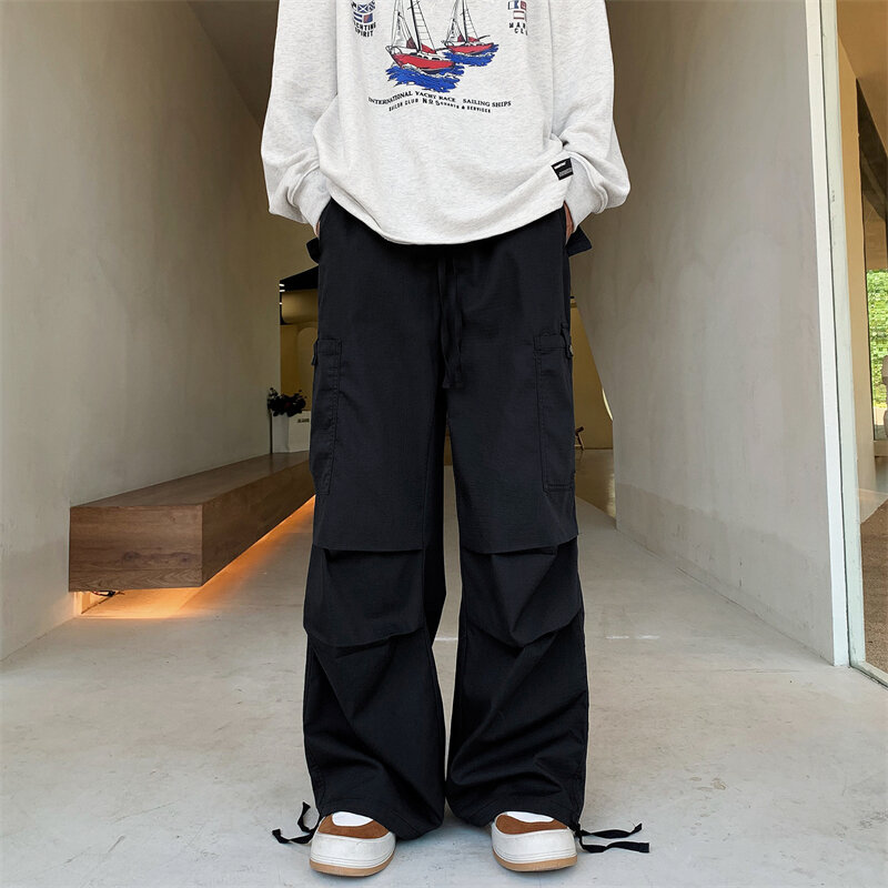 Calça de cintura elástica para homens, monocromática larga larga, bolso múltiplo, streetwear casual, primavera, H82, 2023