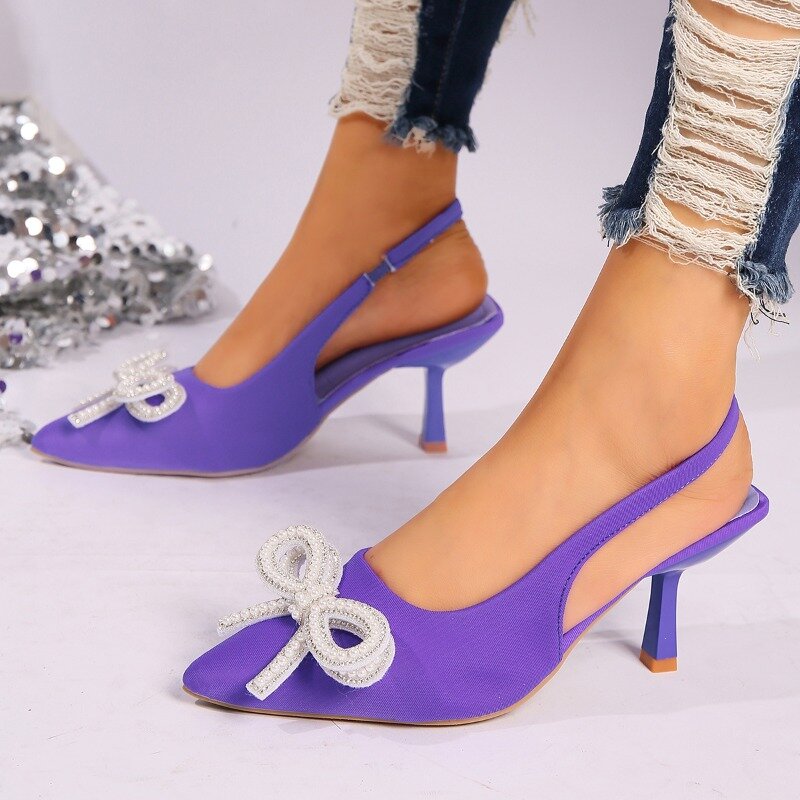 Sandalias de tacón de aguja con lazo de perlas para mujer, zapatos elegantes puntiagudos de Color sólido para fiesta, 2024