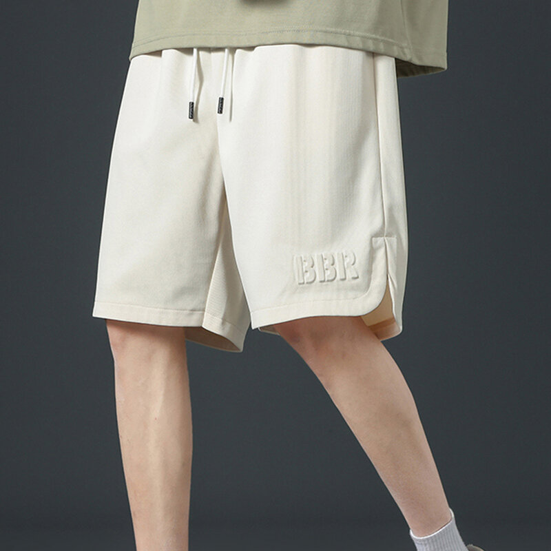 Pantaloncini goffrati con lettera da uomo estate 2024 Streetwear pantaloncini da spiaggia dritti larghi moda coreana Casual versatili pantaloncini di tendenza sottili