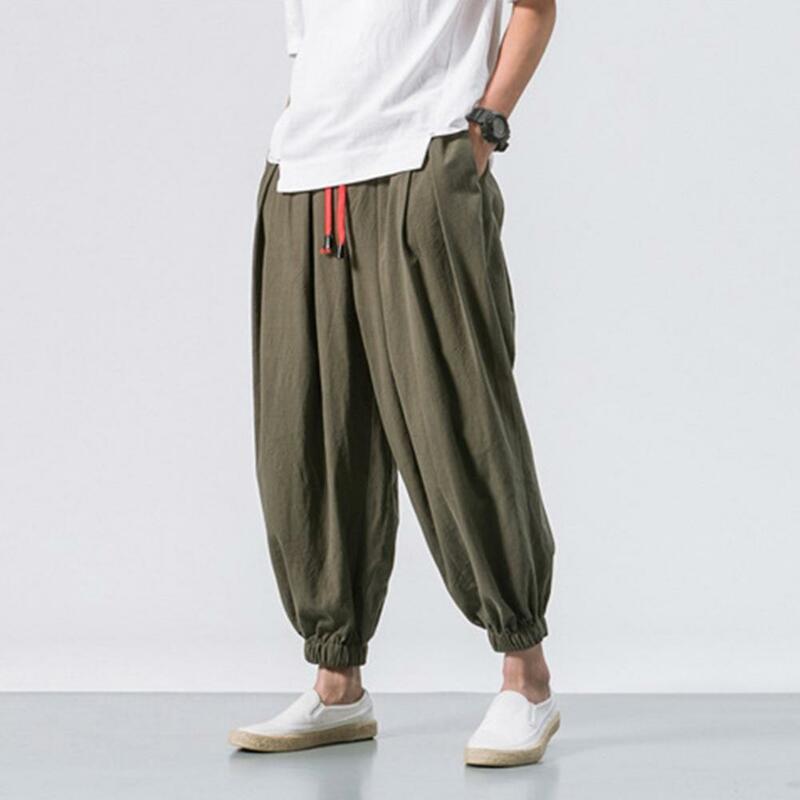 Pantalones de chándal bombachos para hombre, ropa de calle de Color sólido, cintura elástica, cordón suelto, bolsillos, Hip Hop, Verano
