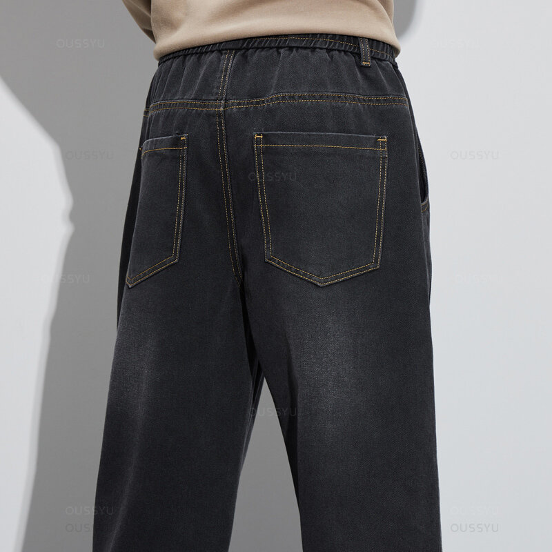 Odzież marki OUSSYU nowy projekt dżinsy bawełniane mężczyzn luźna elastyczna talia ładunkowa spodnie dżinsowe pracy z szerokimi nogawkami spodnie koreańskie mężczyzn 4XL