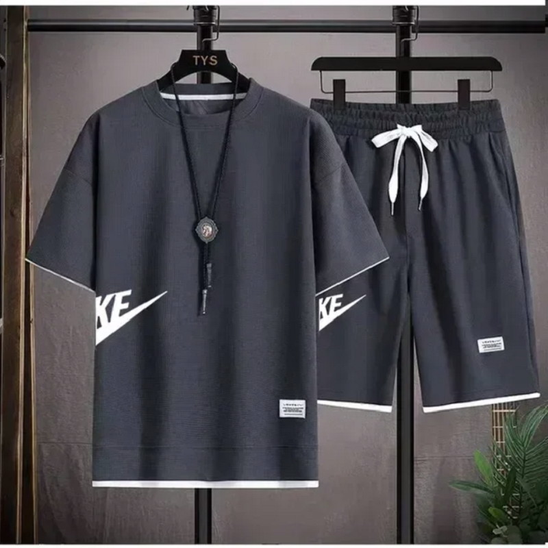 Set pakaian olahraga pria baru, kaos lengan pendek + celana pendek olahraga edisi Korea modis Musim Panas 2024