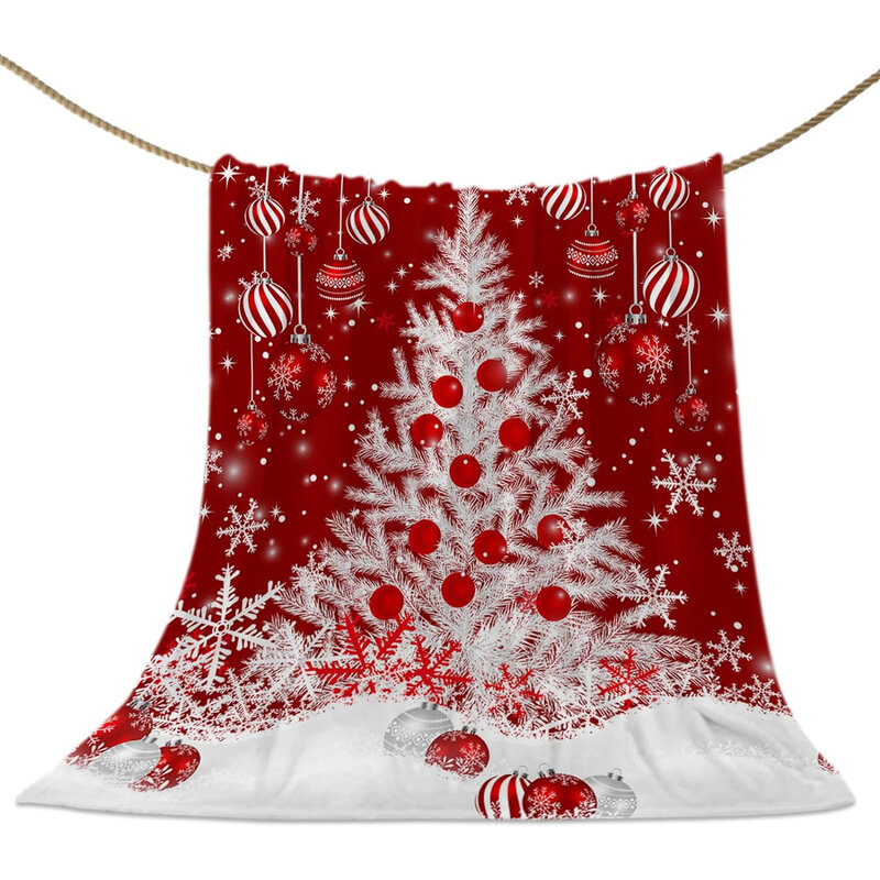 Coperte natalizie, coperte rosse, fiocchi di neve bianchi dell'albero di natale, coperte di peluche a sfera rossa decorano i regali di natale a casa