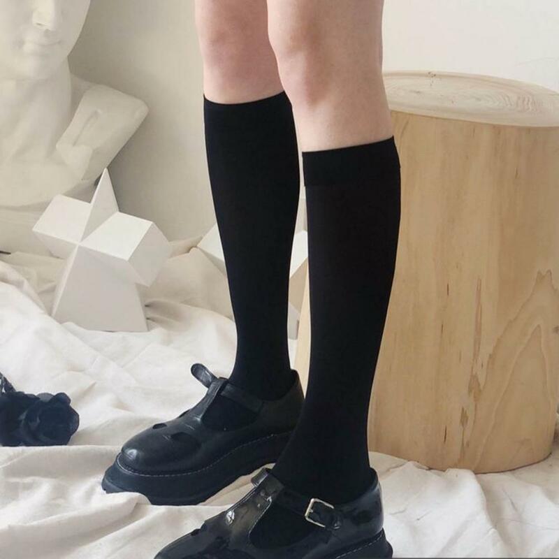 Stoking hitam panjang gaya Jepang kuliah wanita stoking betis warna Solid Lolita tinggi di atas lutut untuk wanita kaus kaki tabung sedang elastis