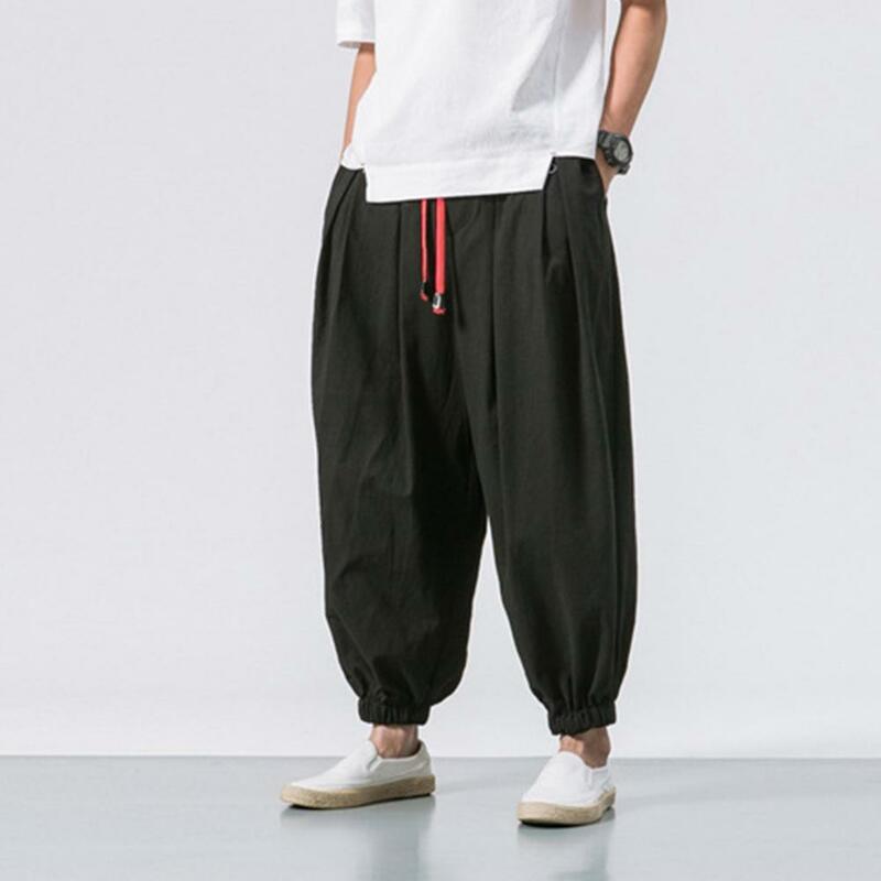 Celana Harem Streetwear pria, celana olahraga warna polos pinggang elastis longgar tali serut Hip Hop bersaku Streetwear musim panas