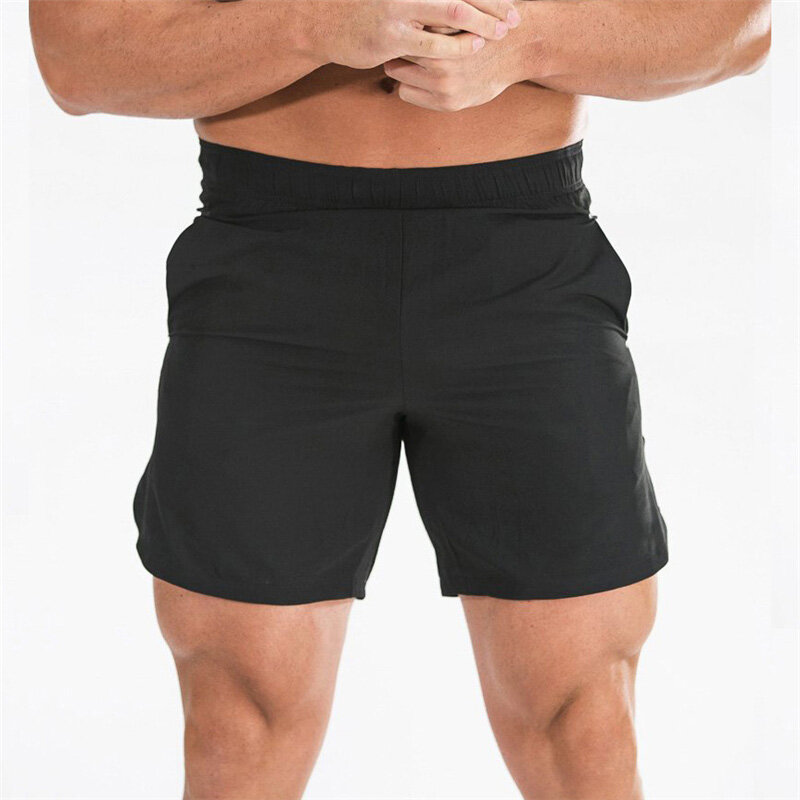 Celana pendek pria, celana pendek Solid cepat kering pakaian olahraga Gym latihan lari musim panas
