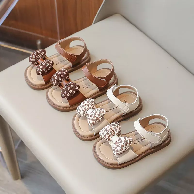 Sandalias de estilo coreano con pajarita para niña, chanclas planas de Punta abierta de princesa, suaves, elegantes, para playa, Verano