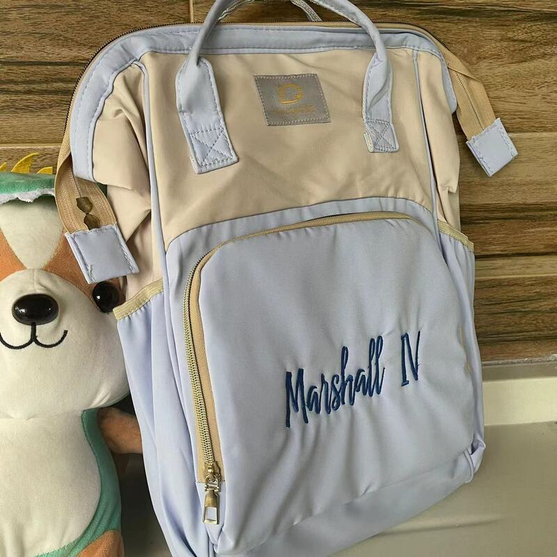Tas Travel ibu dan bayi, kustom kapasitas besar warna Solid tas pengiriman nama bordir multifungsi tas perjalanan ibu