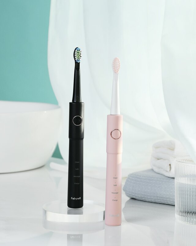 Fairywill Sonic elektrische tandenborstel E11 waterdichte USB-lading met 8 borstelvervangende koppen zwart en roze set voor paar