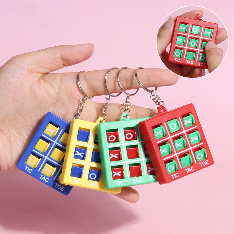 Mini llavero de juego de Tic-tac-toe de interés, rompecabezas colgante, descomprimir XO Spin, juego de ajedrez, juguetes para niños, 1 pieza