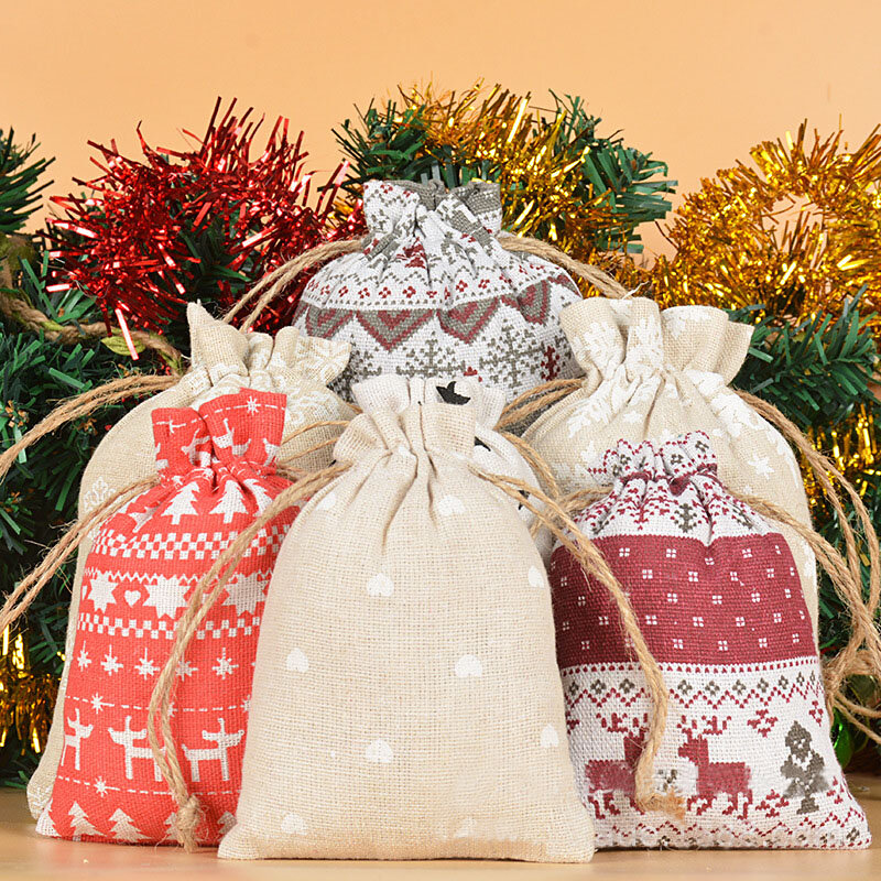 50 Uds. Bolsas con cordón de tela de lino Feliz Navidad al por mayor 10*14cm, 13*18cm bolsas pequeñas de almacenamiento para niños bolsas de bolsillo recuerdos de fiesta