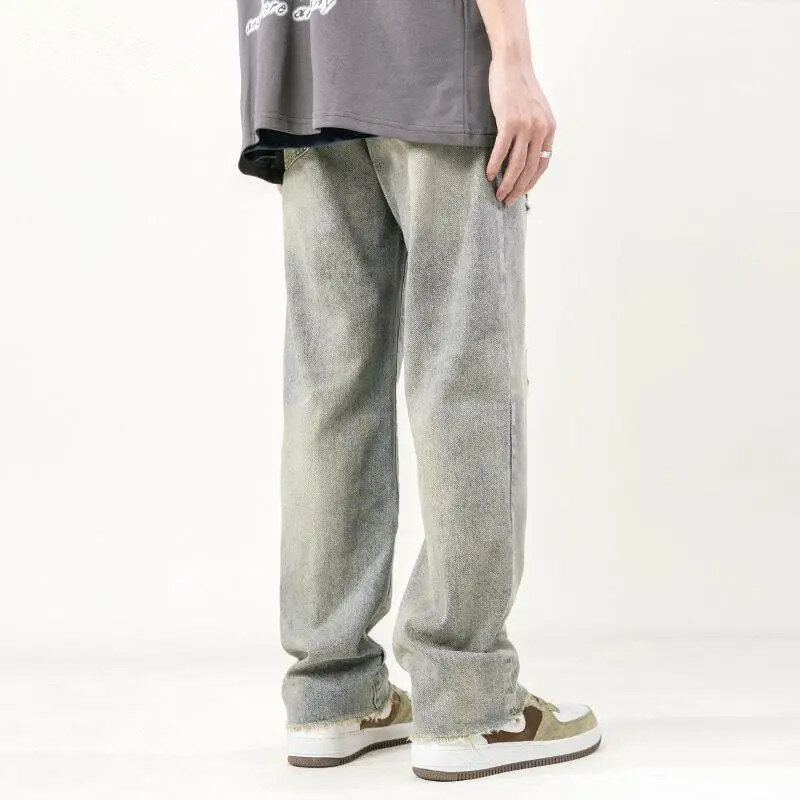 High Street-pantalones vaqueros rectos para hombre, Jeans sueltos de Color sólido con agujeros, dobladillo peludo, bolsillo con botón, Y2K, A163